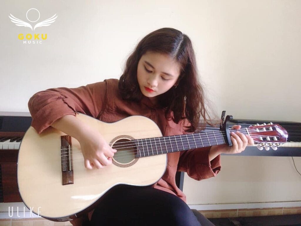 Hướng dẫn chọn đàn guitar classic theo chiều cao cho người mới 1 Hướng dẫn chọn đàn guitar classic cho người mới