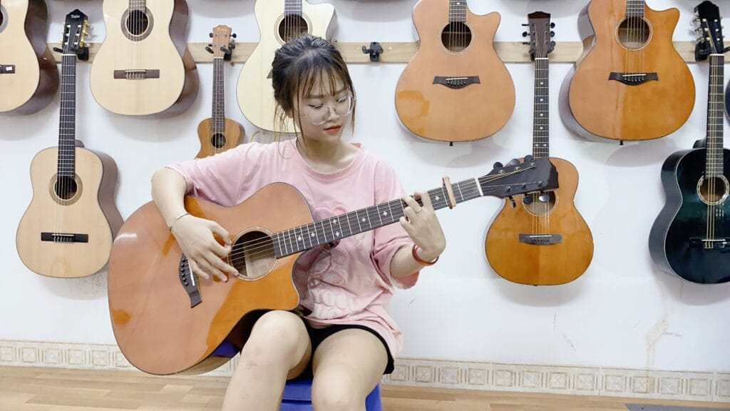 Mua đàn guitar Acoustic 